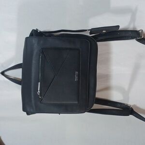 REACTION by KENNETH COLE BACK PACK PURSE IS A BEAUTIFUL BLACK ⚫️